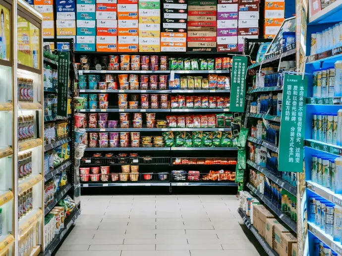 assorted labeled boxes on shelf